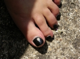 Linda - CND Voodoo Black Nail Enamel With Gold Dot Flowers On Natural Toe Nails